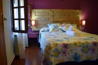 Postel nebo postele na pokoji v ubytování Casa Rural Molí de Fòrnols