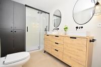 A bathroom at 70sqm private terrace in front of the sea & 107sqm brand new apartment