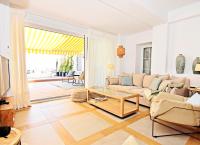 A seating area at 70sqm private terrace in front of the sea & 107sqm brand new apartment