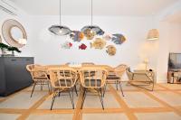 A seating area at 70sqm private terrace in front of the sea & 107sqm brand new apartment
