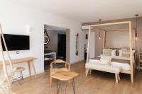 Posteľ alebo postele v izbe v ubytovaní Seaside A Lifestyle Resort - Adults Only