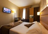 Posteľ alebo postele v izbe v ubytovaní LH Hotel Sirio Venice