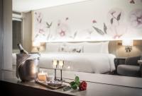Postel nebo postele na pokoji v ubytování Sivatel Bangkok Hotel