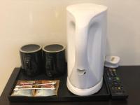 SANDY GARDEN RESORT LANGKAWIにあるコーヒーまたはお茶