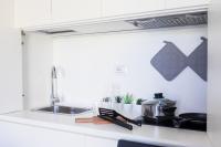 Kuchyňa alebo kuchynka v ubytovaní ASPIO RESIDENCE