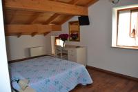 Posteľ alebo postele v izbe v ubytovaní Agriturismo Corte Maccini