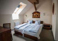 Posteľ alebo postele v izbe v ubytovaní Pension Horse Inn