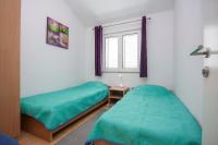 Posteľ alebo postele v izbe v ubytovaní Apartment Pico Bello