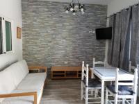 TV a/nebo společenská místnost v ubytování Vivienda Vacacional Meridiano