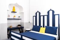 A bed or beds in a room at Maison Il Conservatorio