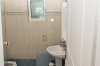 Kúpeľňa v ubytovaní Doroufi Inn