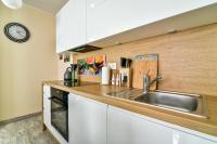 Kuchyňa alebo kuchynka v ubytovaní Małe Orłowo LTC - Apartments