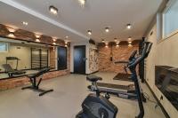 Posilňovňa alebo fitness centrum v ubytovaní Małe Orłowo LTC - Apartments