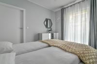 Posteľ alebo postele v izbe v ubytovaní Małe Orłowo LTC - Apartments