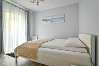 Posteľ alebo postele v izbe v ubytovaní Małe Orłowo LTC - Apartments
