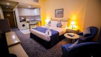Green House Hotel Suites & Apartmentにあるキッチンまたは簡易キッチン