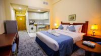 Green House Hotel Suites & Apartmentにあるベッド