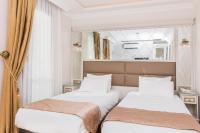 Postel nebo postele na pokoji v ubytování City Hall Hotel Sultanahmet