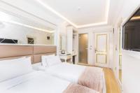 Postel nebo postele na pokoji v ubytování City Hall Hotel Sultanahmet
