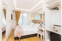 Postel nebo postele na pokoji v ubytování City Hall Hotel Sultanahmet