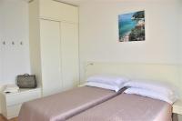 Posteľ alebo postele v izbe v ubytovaní ASPIO RESIDENCE