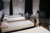 Postel nebo postele na pokoji v ubytování Zafer Hostel