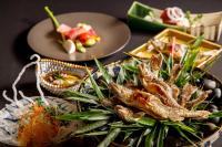 a plate of food on a table with food at Karuizawa Prince Hotel West in Karuizawa