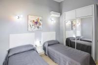 Postel nebo postele na pokoji v ubytování Villa Miranda