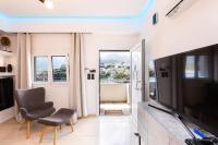 TV a/nebo společenská místnost v ubytování Ocean Dream Apartment!
