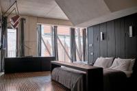 Łóżko lub łóżka w pokoju w obiekcie Hotel Monopol