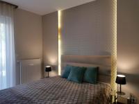 Posteľ alebo postele v izbe v ubytovaní Luna apartment