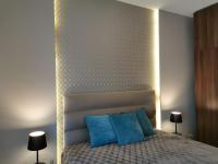 Posteľ alebo postele v izbe v ubytovaní Luna apartment