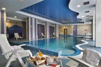 The swimming pool at or close to Rhodopi Home Hotel Chepelare - Half Board & All inclusive
