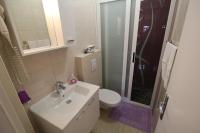 Koupelna v ubytování La Storia Apartments