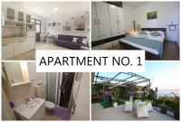 Kuchyň nebo kuchyňský kout v ubytování La Storia Apartments