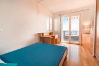 Postel nebo postele na pokoji v ubytování La Storia Apartments