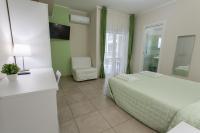 A bed or beds in a room at I Granai Messina