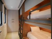 a bedroom with two bunk beds in a room at Bouti City Capsule Inn in Taipei