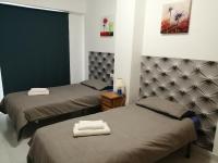 Postel nebo postele na pokoji v ubytování Casas Holiday - Playa del Cura 2