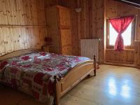 A bed or beds in a room at Casevacanza Val d'Ayas