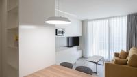 Televízia a/alebo spoločenská miestnosť v ubytovaní Iberflat APARTAMENTOS LOS PINOS