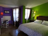 Postel nebo postele na pokoji v ubytování Apartamentos La Iguana