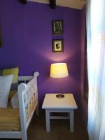 Postel nebo postele na pokoji v ubytování Apartamentos La Iguana