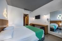 Postel nebo postele na pokoji v ubytování Zeus Hotel