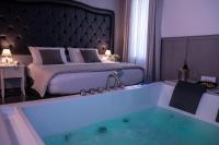 Villa Elisio Hotel & Spaにあるベッド
