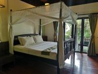 Postel nebo postele na pokoji v ubytování Kao Tao Villa Beach Resort-Hua Hin