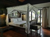 Postel nebo postele na pokoji v ubytování Kao Tao Villa Beach Resort-Hua Hin