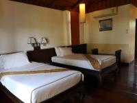Postel nebo postele na pokoji v ubytování Kao Tao Villa Beach Resort-Hua Hin