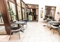 Reštaurácia alebo iné gastronomické zariadenie v ubytovaní Pension Horse Inn