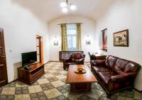 Televízia a/alebo spoločenská miestnosť v ubytovaní Pension Horse Inn